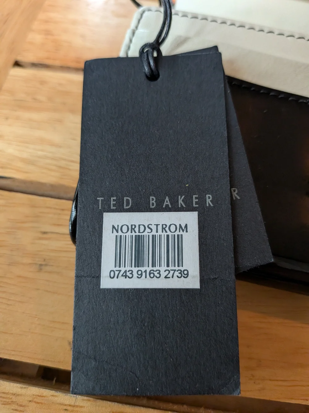 Ted Baker Black Wallet with White Dog Print and Orange Accents